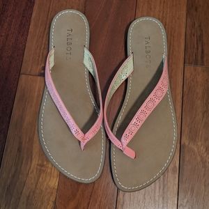 Pink flip flops with cute detailing!
